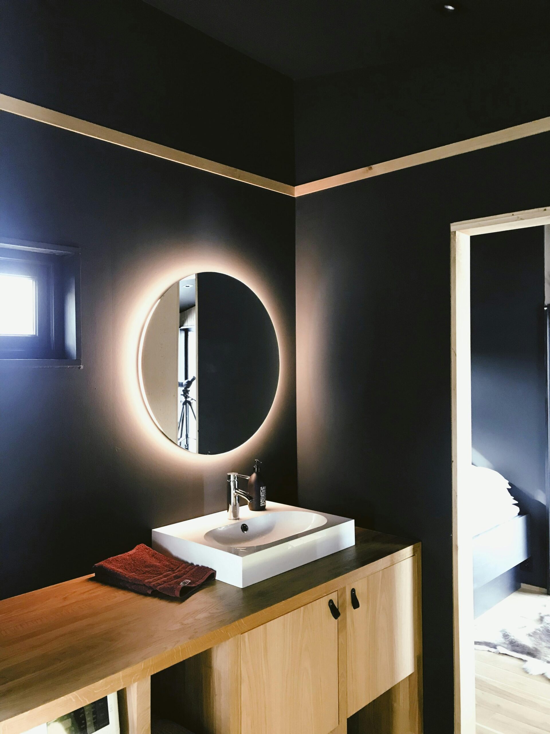 pexels photo 2207894 2207894 A sleek and contemporary Scandinavian bathroom with modern fixtures and ambient lighting.